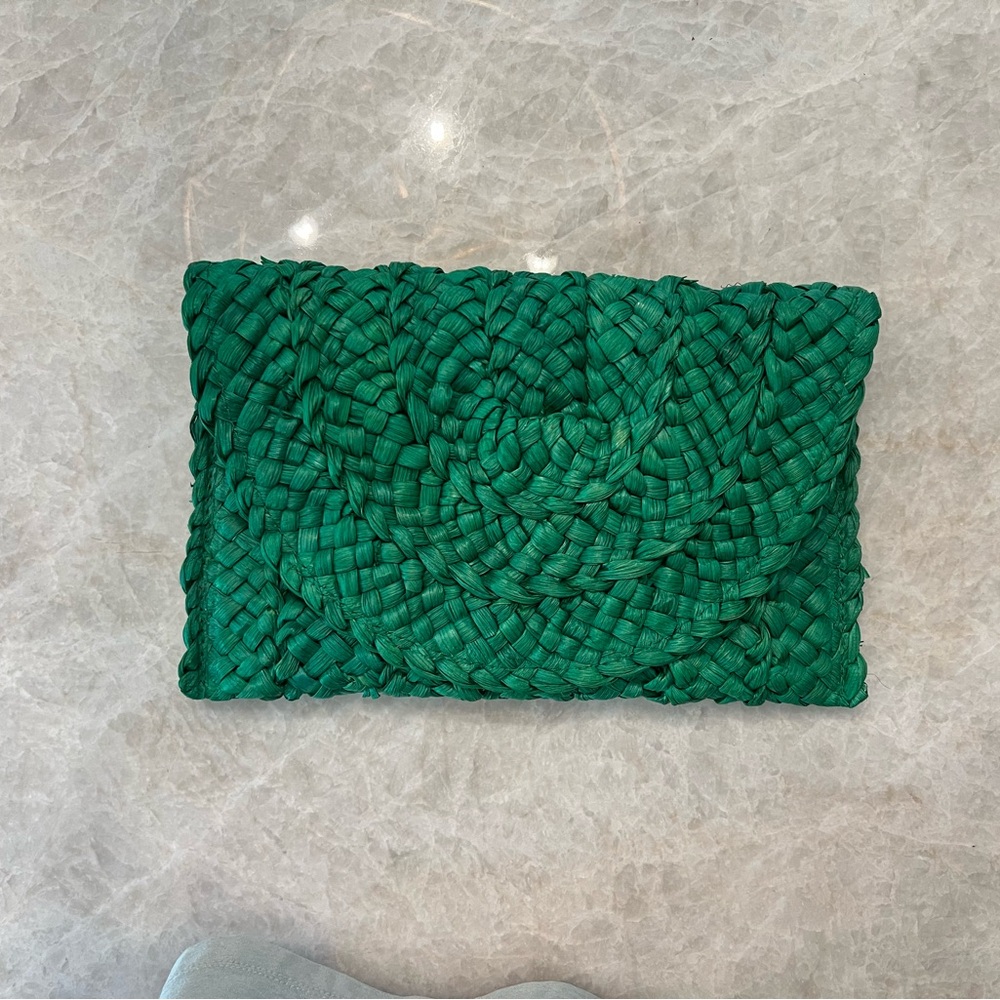 Women’s green clutch